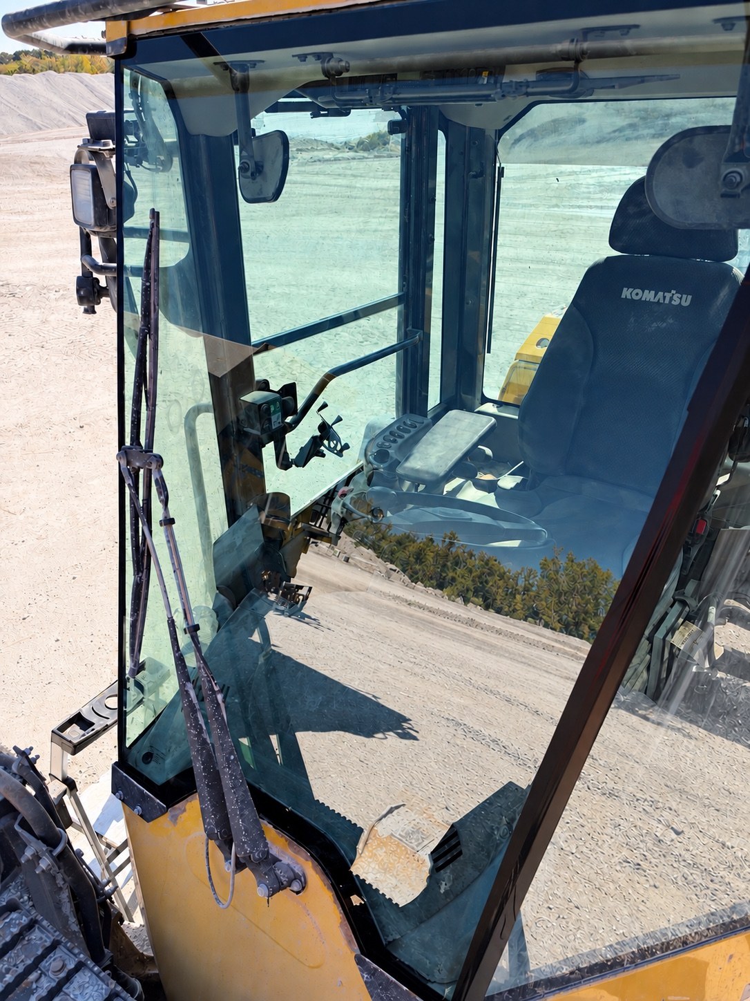 New windshield installed on the Komatsu WA320 wheel loader